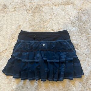Size 2 great condition Lululemon athletica Navy Camouflage Mini Skirt.